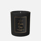 black candle in jar